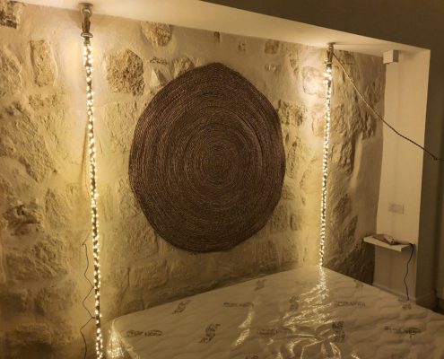 Illuminazione testata letto