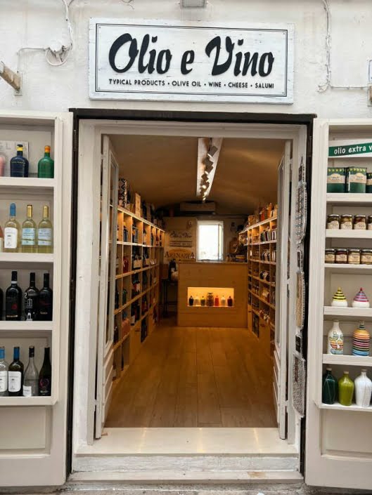 Insegna olio e vino