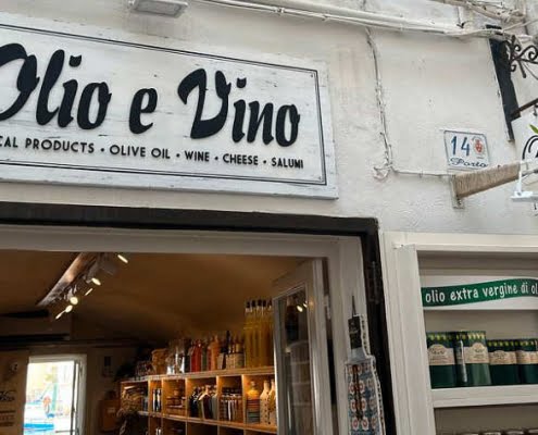 Insegna olio e vino