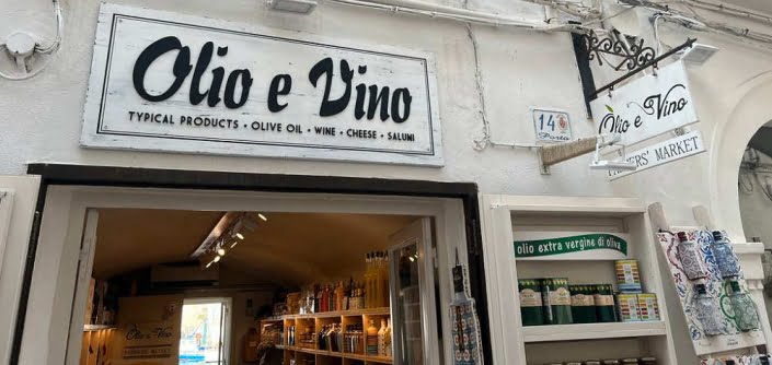 Insegna olio e vino