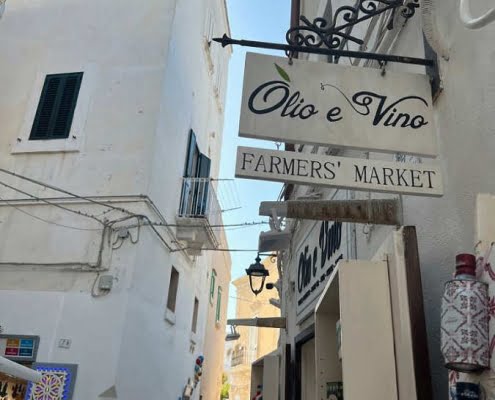 Insegna olio e vino