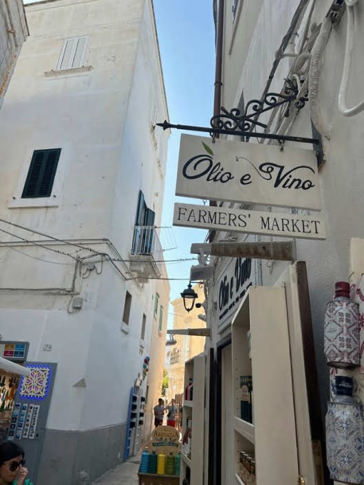 Insegna olio e vino