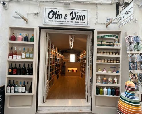 Insegna olio e vino