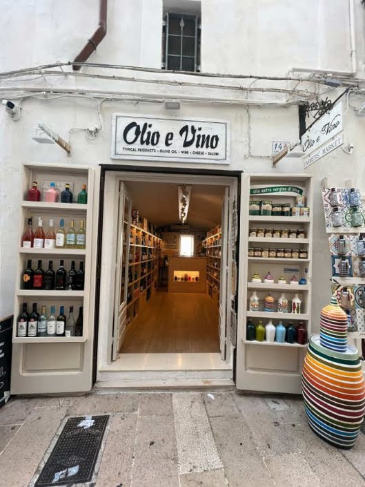 Insegna olio e vino